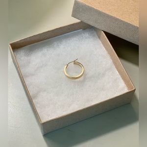 Bony Levy single hoop. 3/4" hoop diameter: 1/8" width. High polish 14k gold.